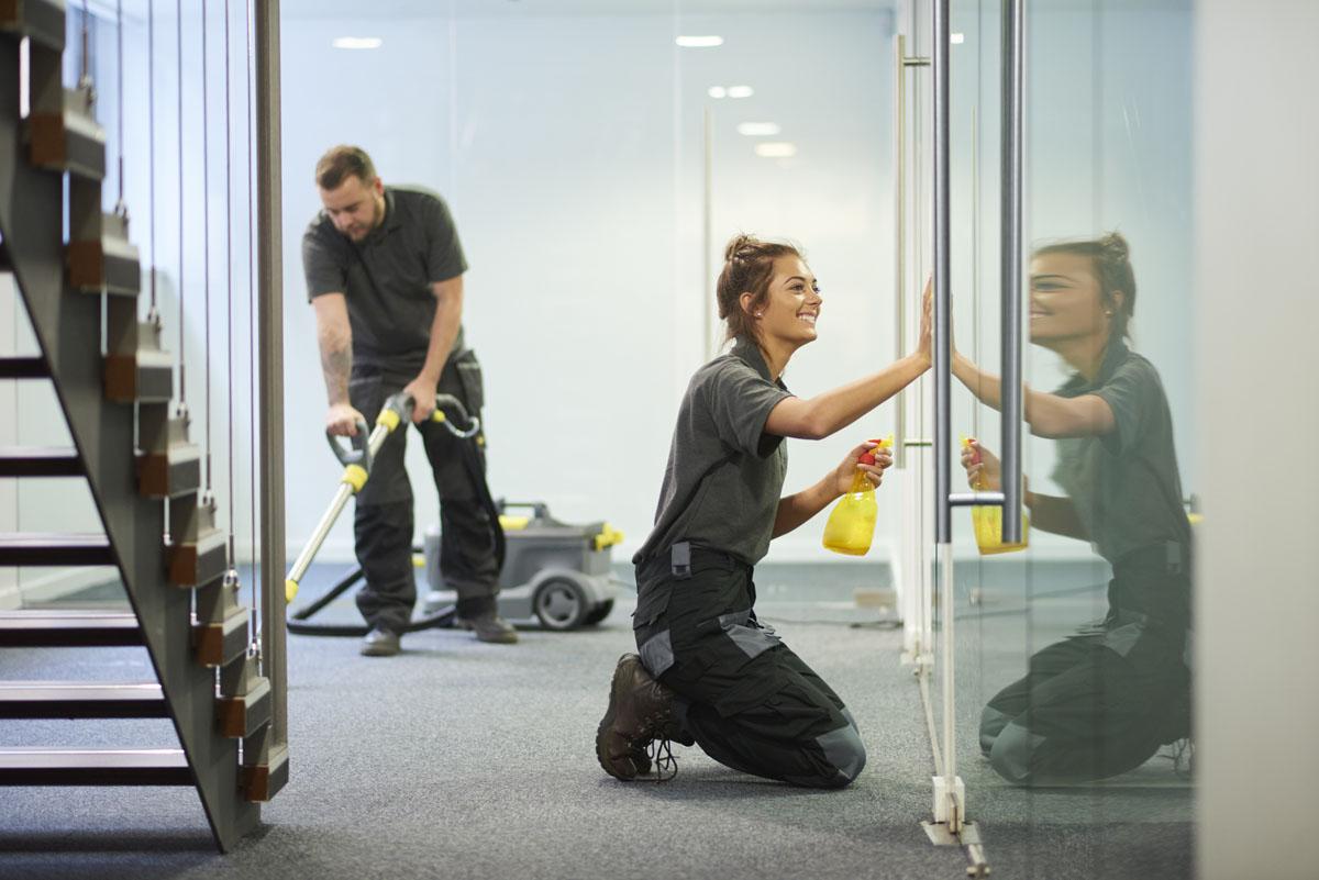 People vacuuming and cleaning windows